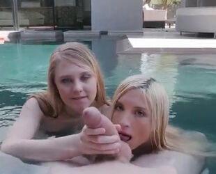 2 nubile chicks gargle in the pool